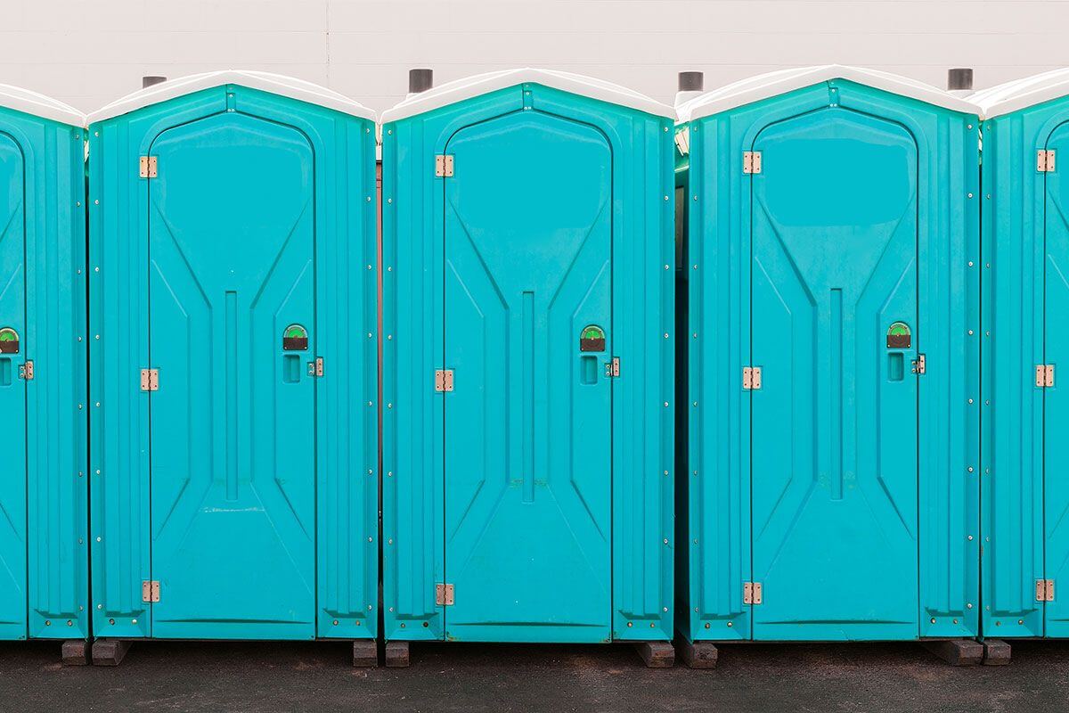 Industrial portable restroom units at a plant in South Portland, Maine